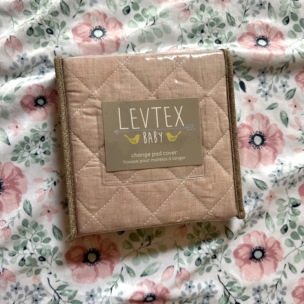 Levtex changing pad cover in dusty rose
